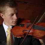 Jacob playing his violin